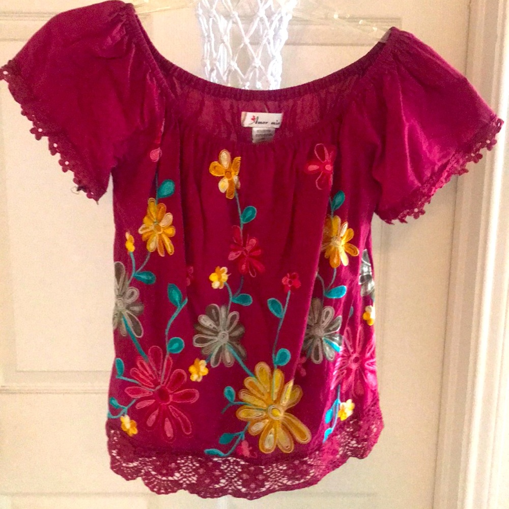 A beautiful embroidered Off the shoulder blouse